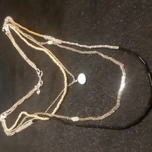 Loft layered gold ,black,silver seed beads with small natural stone pendant